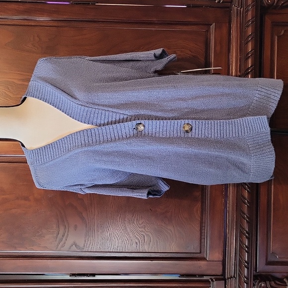 Tribal Sweaters - Tribal button-down short-sleeved cardigan.